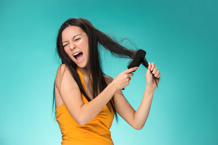 frustrated-young-woman-having-bad-hair_155003-1763