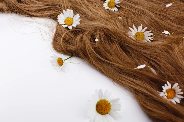 little-white-flowers-lie-brown-hair-curls_8353-7031